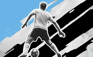 a crown legacy fc soccer player dribling 